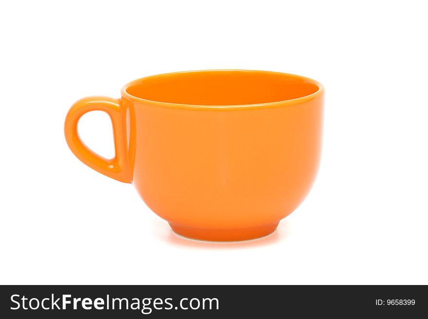 Beautiful orange cup on a white background