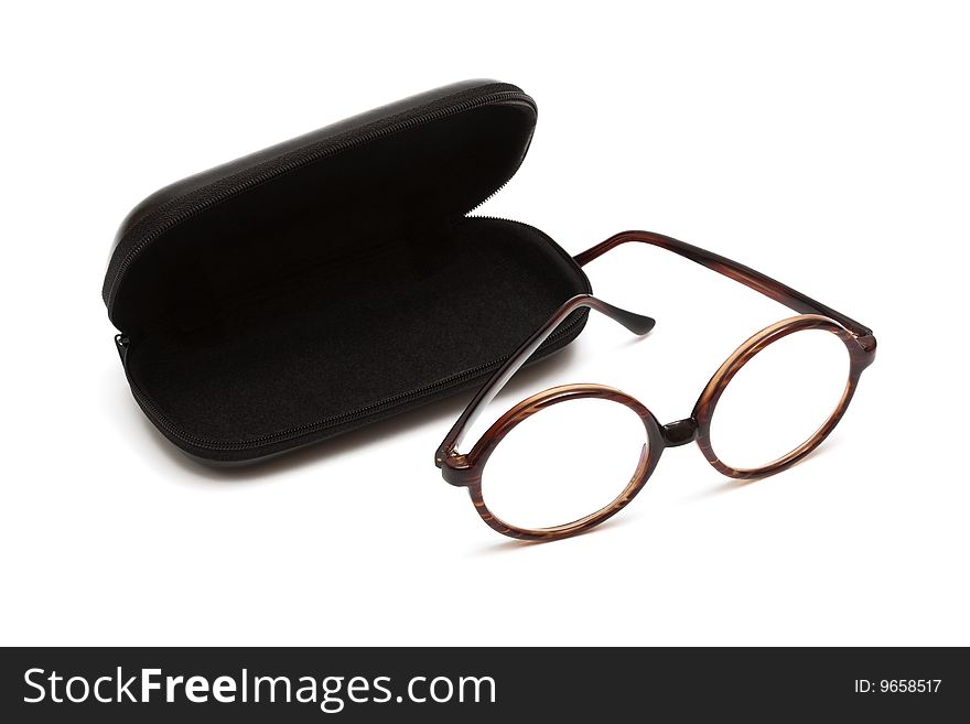 Glasses in case against a white background