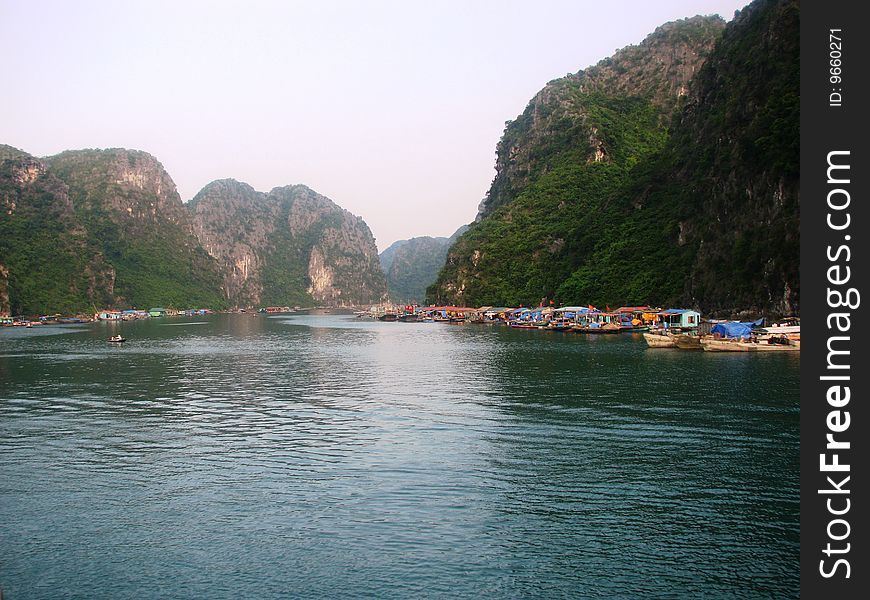 Photo of the largest floating fishing village in halong bay. Photo of the largest floating fishing village in halong bay.