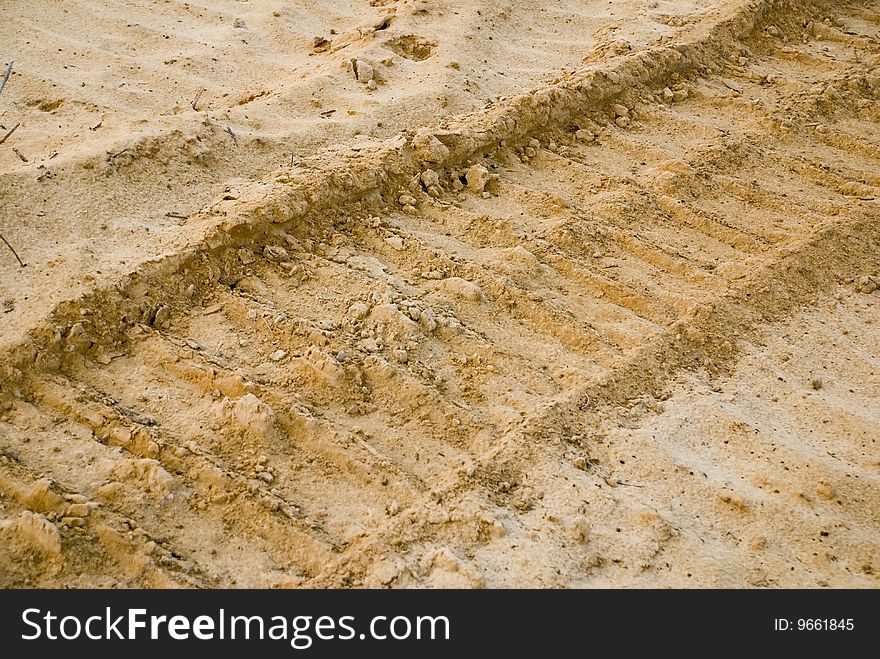 Track on sand from a tractor