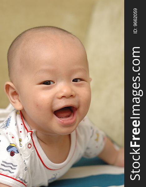 It is a cute chinese baby, isolated. he is 5 months. It is a cute chinese baby, isolated. he is 5 months.