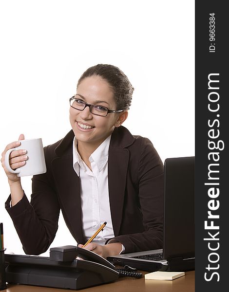 Young woman working and drinking coffe. Young woman working and drinking coffe