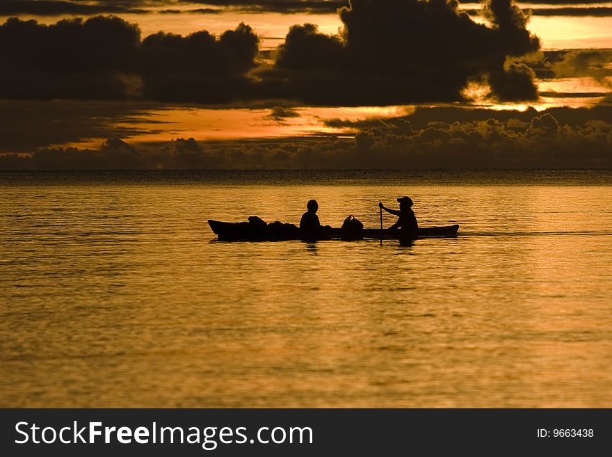 Fishermen at dusk silhouette
