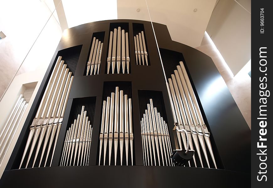 A big and modern black church organ