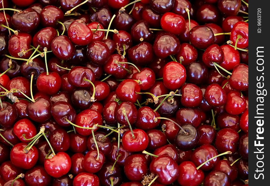 Pile of red cherries at the market
