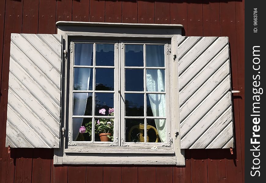 A window of an old wooden museum house