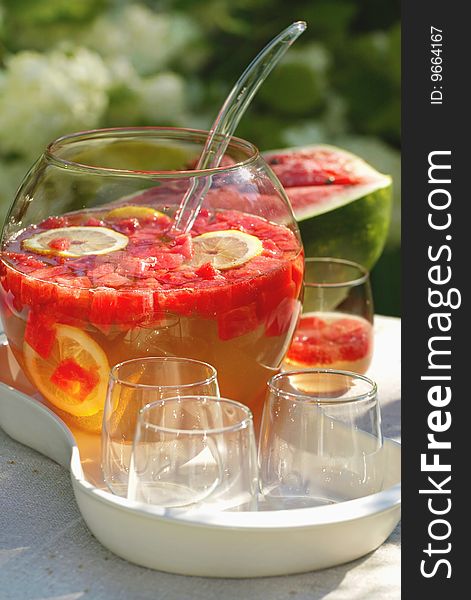 Fresh summer cocktail with fruits