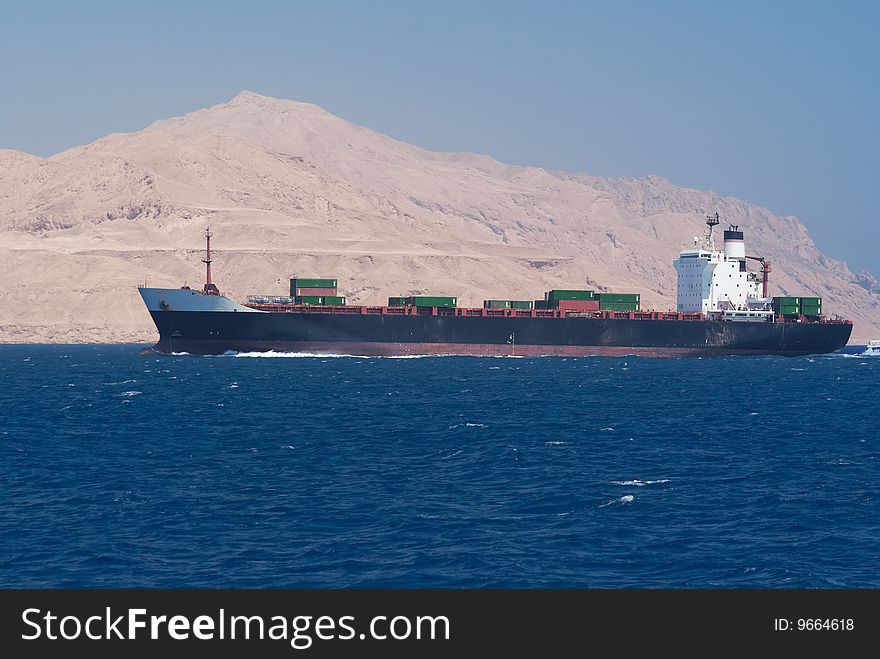 Cargo ship crossing Tiran strait