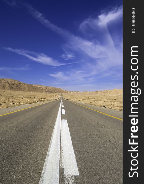 Desert highway and blue sky