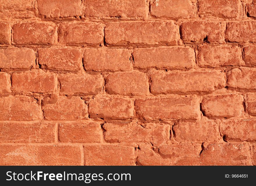 The fragment of the wall of brick.