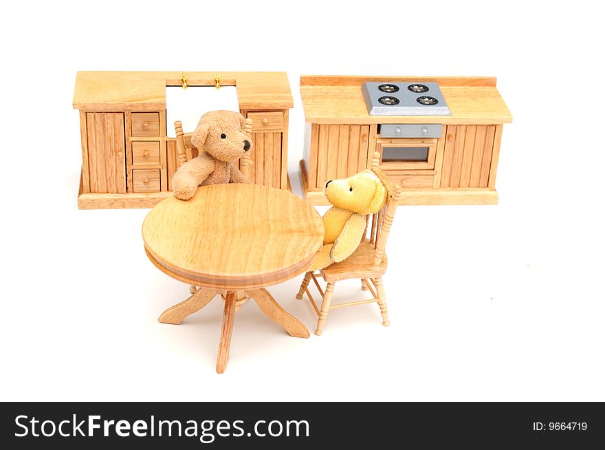 shot of two bears sitting in the kitchen. shot of two bears sitting in the kitchen