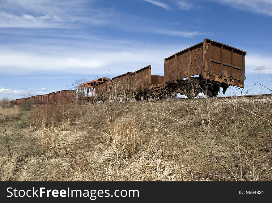 Old abandoned rusting train and railway. Old abandoned rusting train and railway