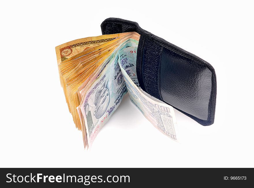 Money in pouch isolated in white background.