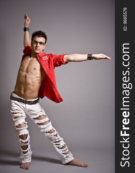 Young Fashion Man Model With Athletic Body Posing