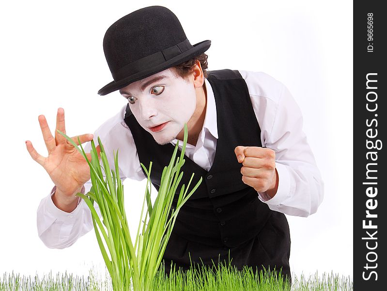 Crazy  gardener mime. Studio shot