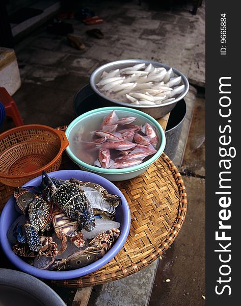 Seafood in plastic basket in Hanoi, Vietnam. Seafood in plastic basket in Hanoi, Vietnam
