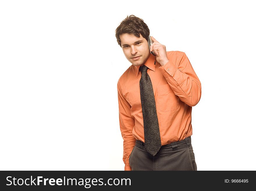 Young, good looking businessman standing in front of a white background. Young, good looking businessman standing in front of a white background