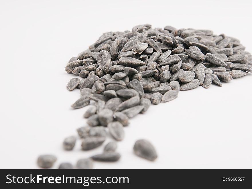 Sunflower seeds isolated over white background