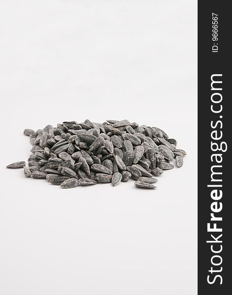 Sunflower seeds isolated over white background