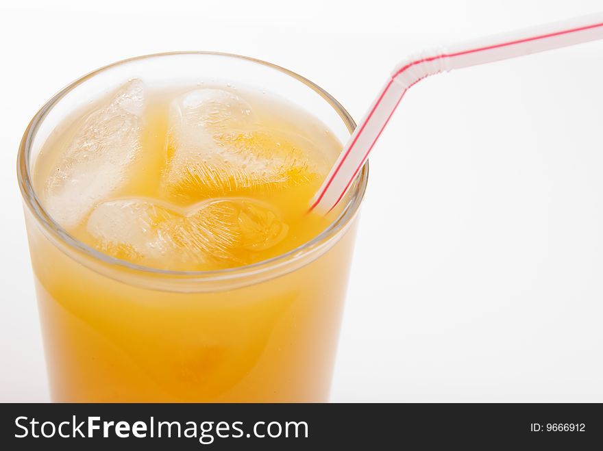 Glass of juice isolated over white background