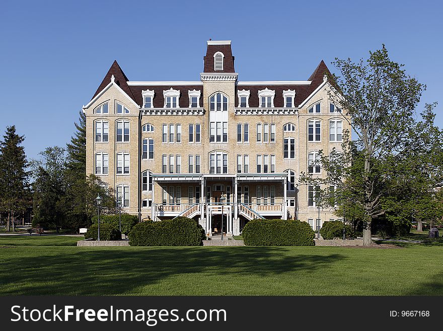 University building in spring on suburban campus