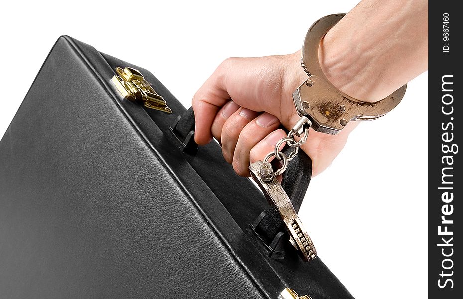 Hand on handcuffs with a briefcase on white background