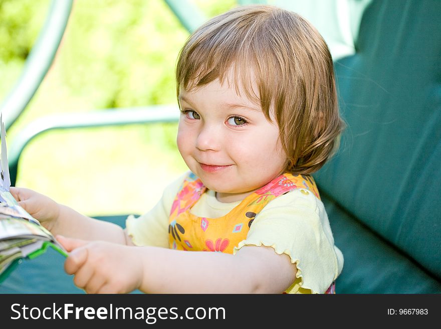 Toddler baby girl in garden. Toddler baby girl in garden