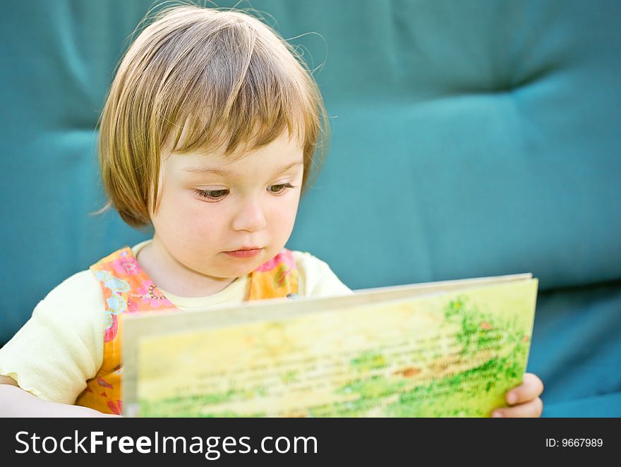 Toddler baby girl in garden. Toddler baby girl in garden