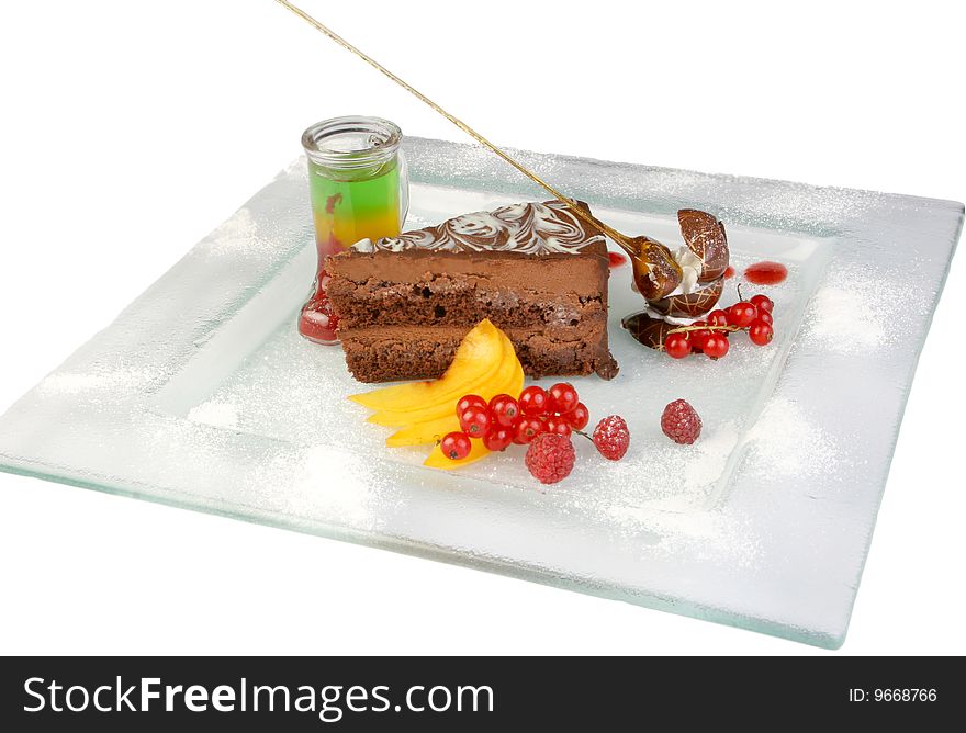 Chocolate Iced Pie with Anise, Fresh Berries and mango and syrup cooking