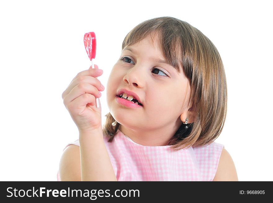 Smiling girl with sweet isolated on the white background