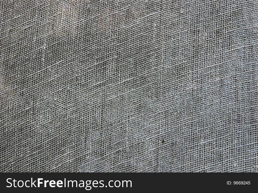 Dirty grey surface of coarse texture as a background. Dirty grey surface of coarse texture as a background