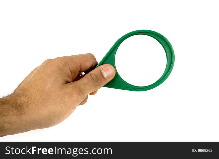 Hand with magnifying green glass. Hand with magnifying green glass