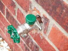 Water Spigot Outside Green Brick Building Stock Photos Water Spigot Outside Green Brick Building Stock Photos