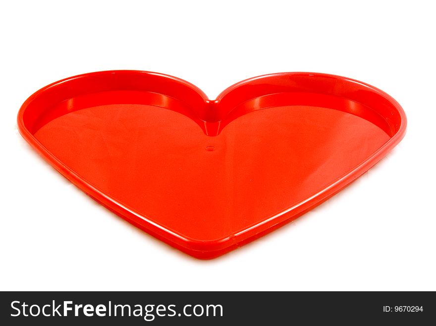 Red heart tray isolated on a white background