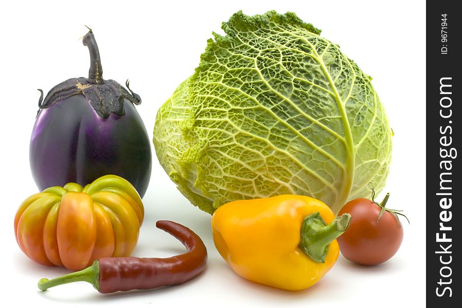 Vegetables Isolated on a white background Egplant, Cabbage, Pepper and Tomatoes
