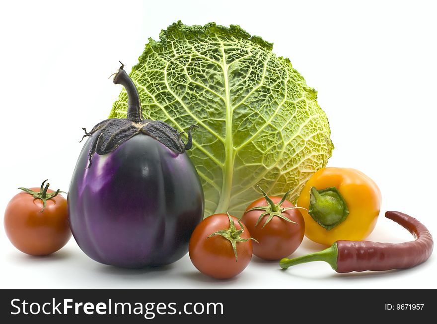 Cabbage, pepper, eggplant and tomatoes isolated on white background. Cabbage, pepper, eggplant and tomatoes isolated on white background