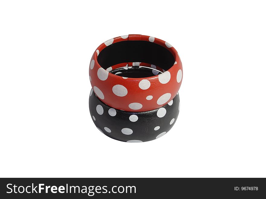 Two female, leather bracelets, red and black, located on the isolated white background