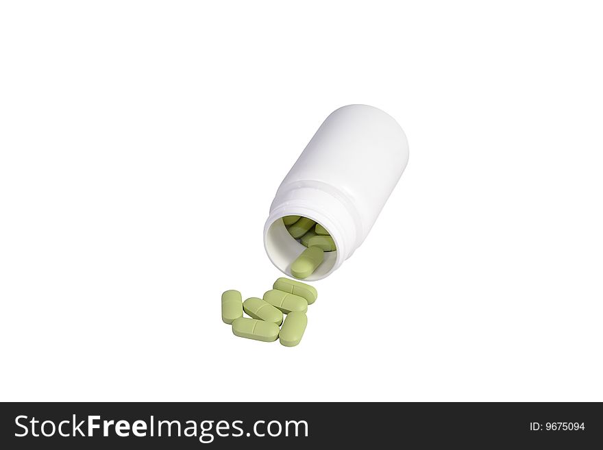 White jar with the tablets, located on the isolated white background