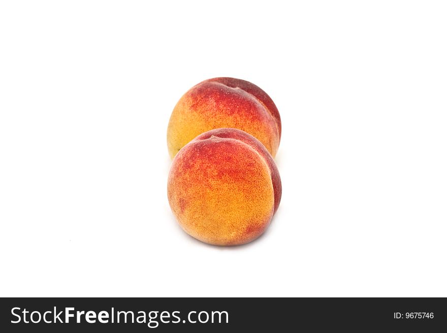Two Isolated Peaches