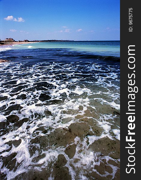 Black sea, blue sky and transparent water