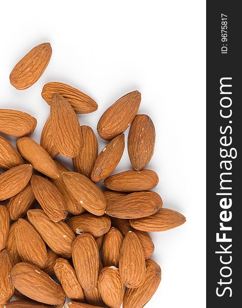 Pile of almonds on white background