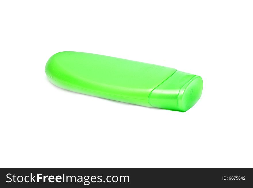 Photo of green shampoo bottle