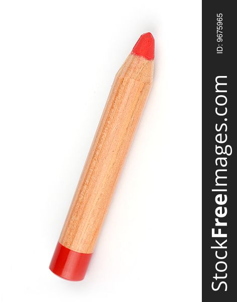 Red pencil on white background