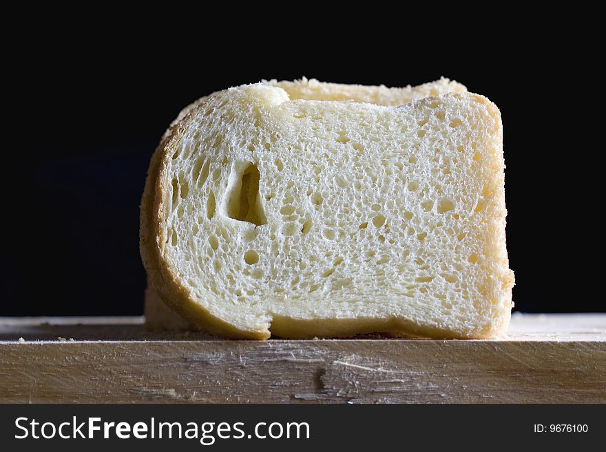 Close up of bread slices on a black background