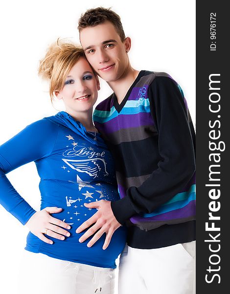 Young lovely caucasian couple expecting their baby. Young lovely caucasian couple expecting their baby