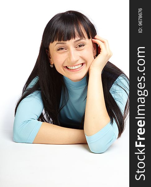 Beautiful Smiling Girl Lying On Floor