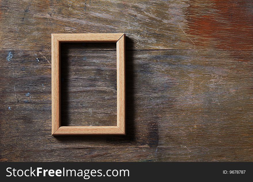 Empty Frame On Wooden Background