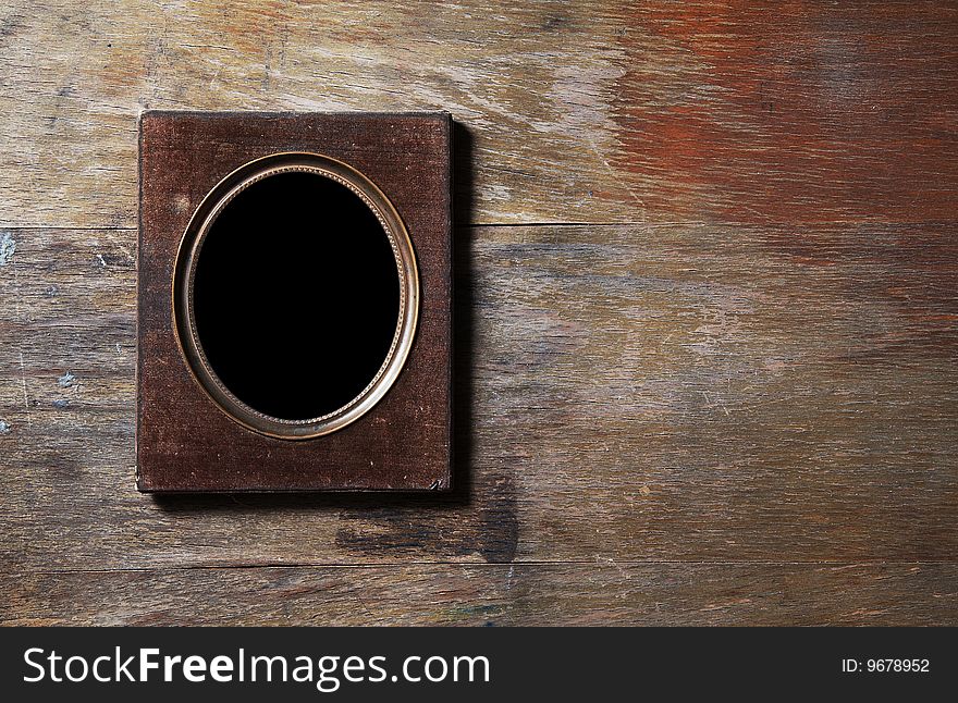 Empty Frame On Wooden Background