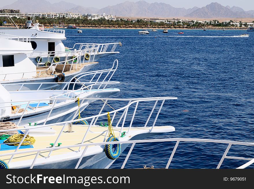 Beautiful boats on a mooring at coast of Red sea in Egypt. Beautiful boats on a mooring at coast of Red sea in Egypt