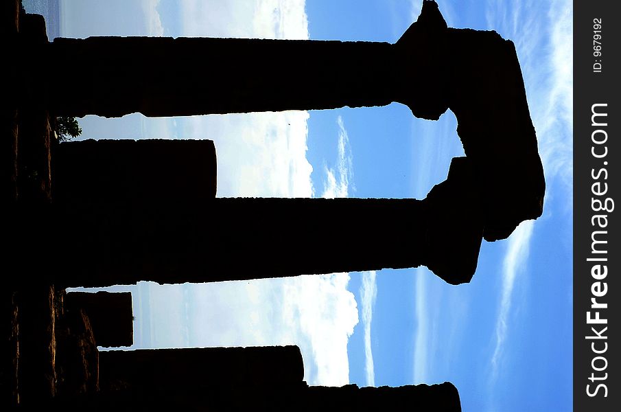 Columns of a Greek temple Ancient ruins columns silhouette - in temple valley agrigento sicily